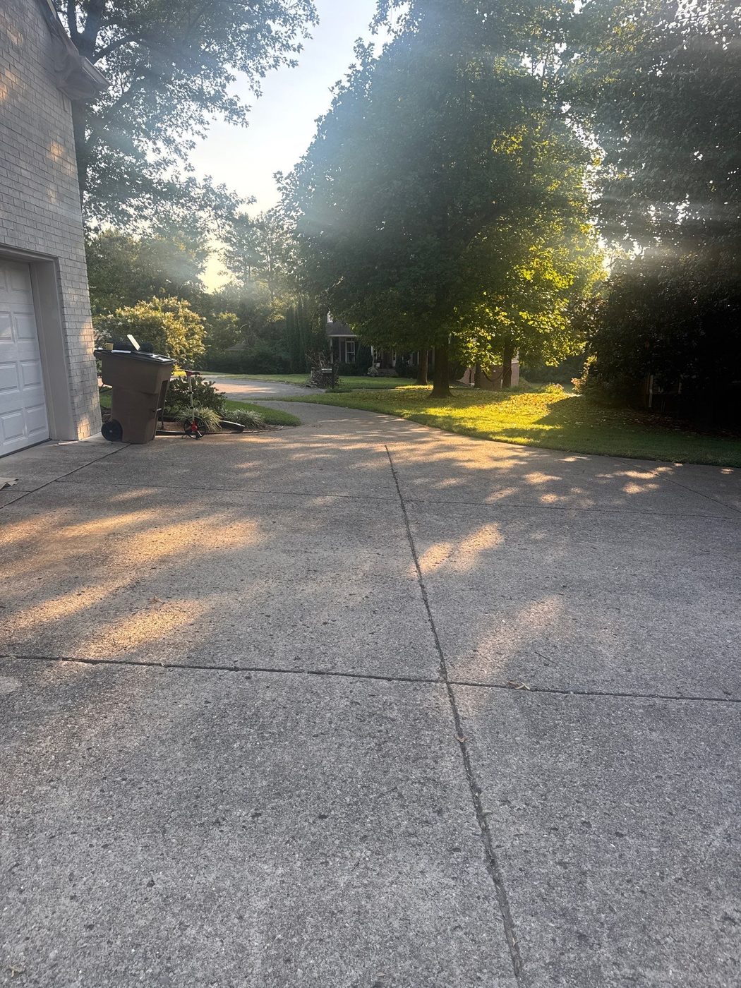 Old cracked driveway in Nashville before removal and replacement