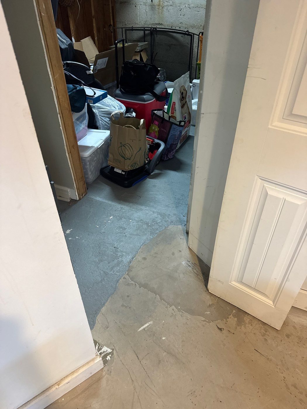 Cracked basement slab in Oak Hill before crack repair and microcement resurfacing